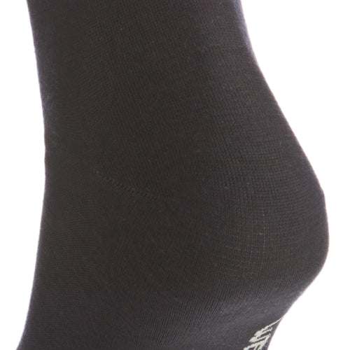 A photo of the ADULT SKI SILK LINER SOCKS - BLACK in use