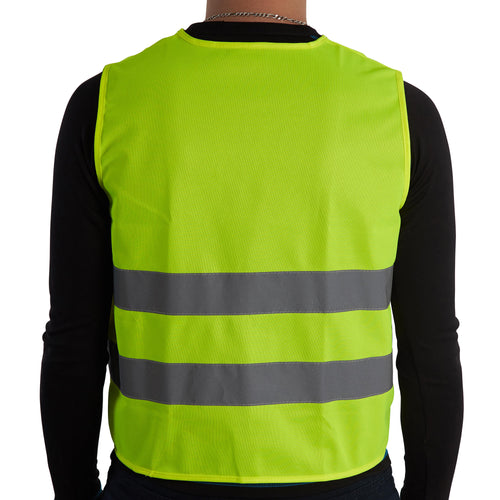 A photo of the Btwin Visibility Safety Vest Kids' in use