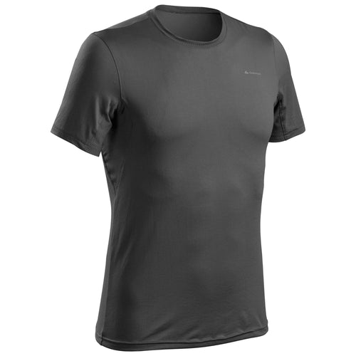 A photo of the Men's Hiking Synthetic Short-Sleeved T-Shirt MH100 in use