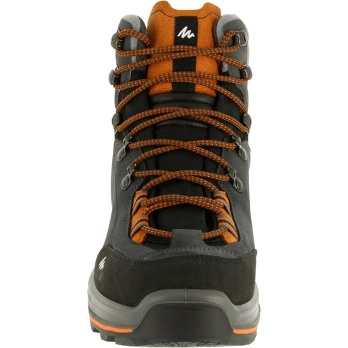 A photo of the Forclaz Trek 100 Hiking Boots Men's in use