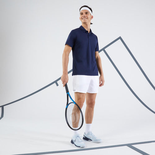 A photo of the Men's Short-Sleeved Tennis Polo Shirt Essential - Navy in use