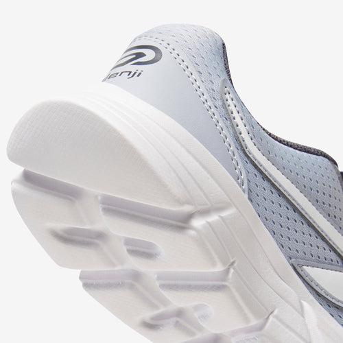 A photo of the EKIDEN ONE WOMEN'S SHOES - GREY in use