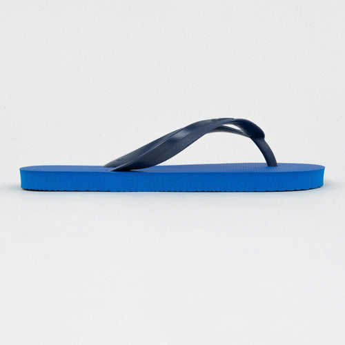 A photo of the Boys' Flip-Flops - 100 Blue in use