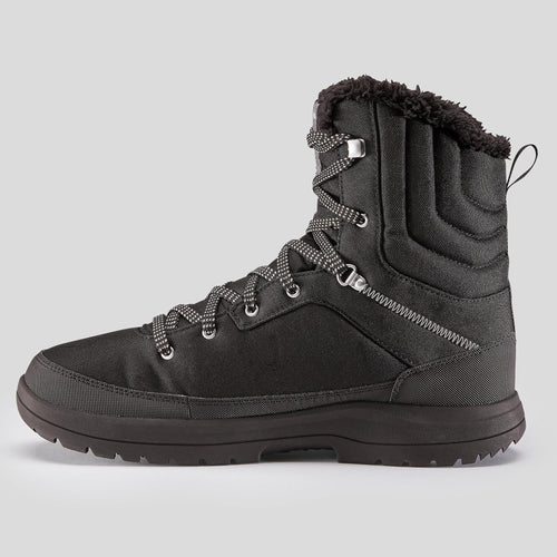 A photo of the Men's Warm and Waterproof Hiking Boots - SH100 High in use
