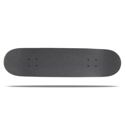 A photo of the Oxelo MID5 Monkey Complete Freestyle Skateboard 31'''x7.75'' in use