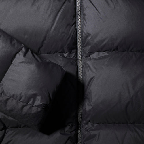 A photo of the Forclaz Men's MT900 Hooded Down Puffer Jacket in use