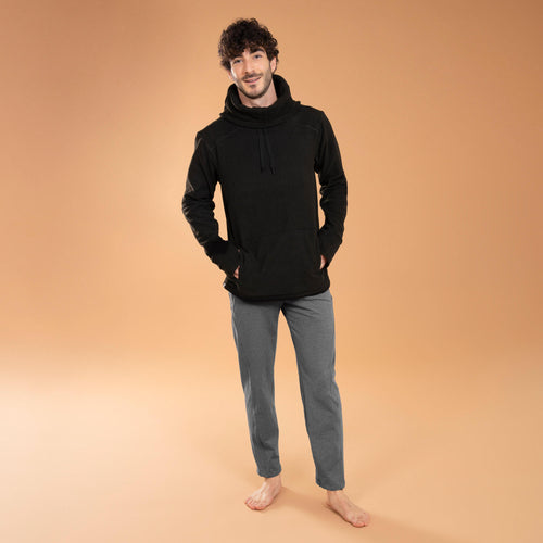 A photo of the Domyos Yoga Pants Men's in use
