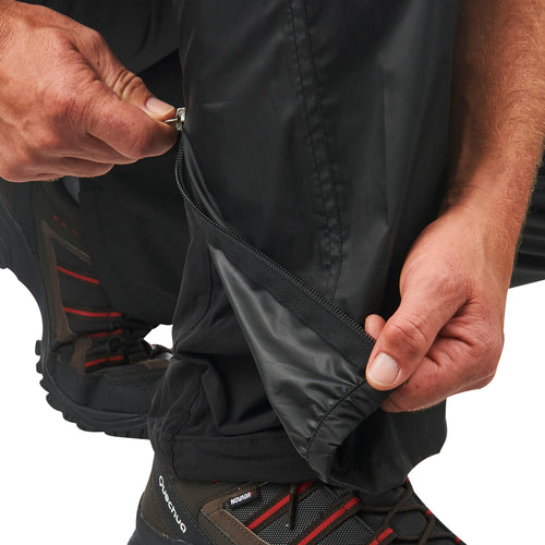 A photo of the Men's Waterproof Hiking OverPants NH500 Imper in use