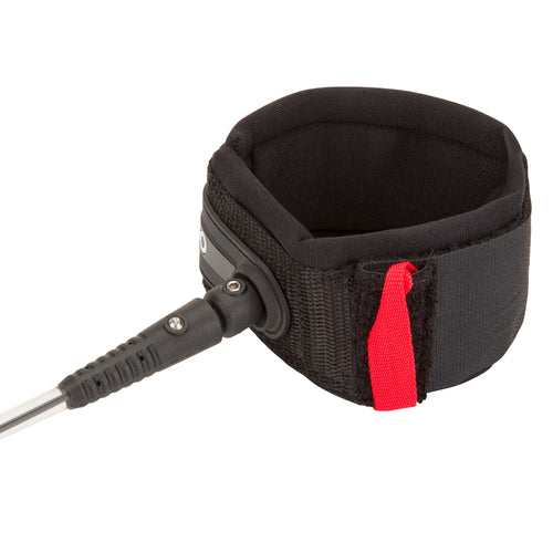 A photo of the Olaian Padded Double Swivel Leash Ø7mm w Rail Saver 6' & 7' Board in use