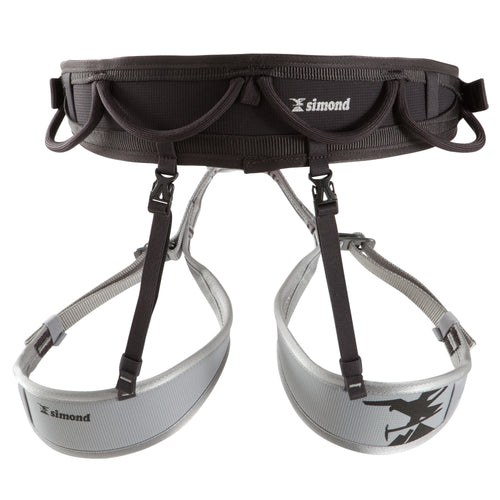 A photo of the CLIMBING AND MOUNTAINEERING HARNESS - ROCK BLACK GREY in use