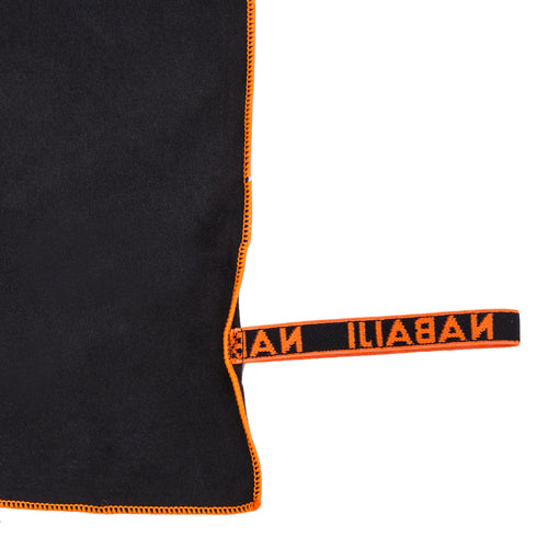 A photo of the Compact Beach Travel Water Camping Hiking Medium 31"x23" Microfiber Towel in use
