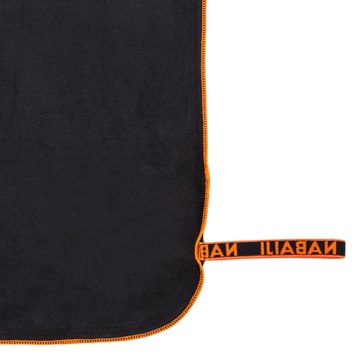 A photo of the Compact Beach Travel Water Camping Hiking Large 51''x31'' Microfiber Towel in use