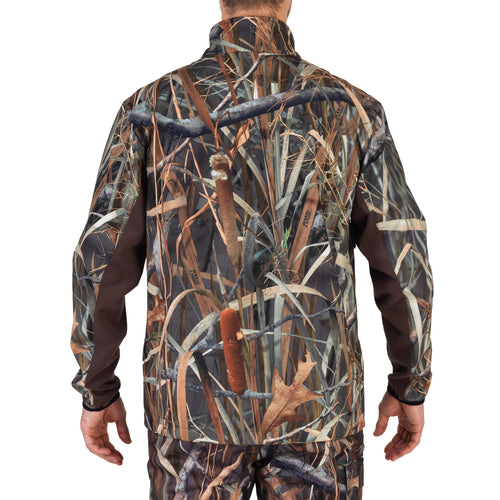 A photo of the Solognac Duck Kamoreed 500 Hunting Softshell 500 Adult in use