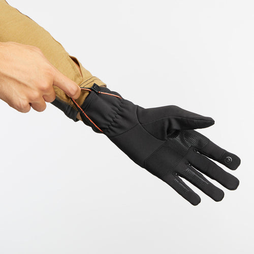 A photo of the Trek 500 Stretch Backpacking Gloves in use