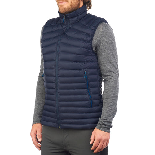 A photo of the Forclaz Men's MT100 Down Puffer Vest in use
