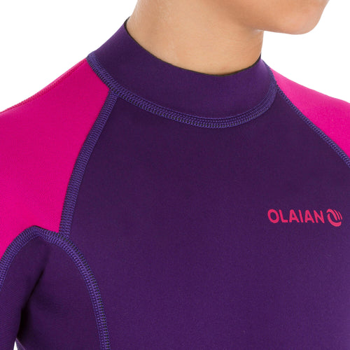 A photo of the Olaian 100 Neoprene Springsuit Surfing Wetsuit Back Zip Shorty 1.5mm Kids in use