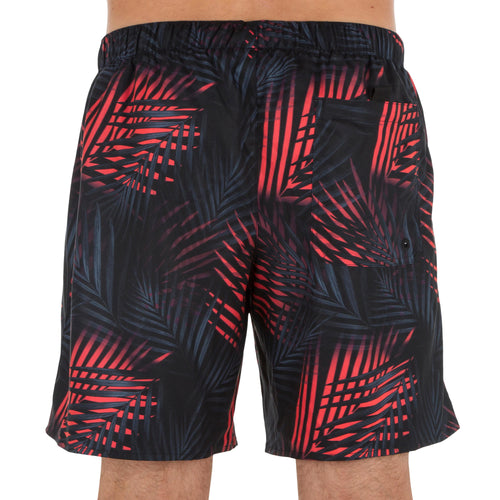 A photo of the Olaian 100 Surfing Boardshorts Men's in use
