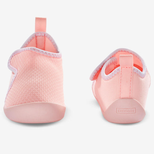 A photo of the Kids' Bootees - Pink in use