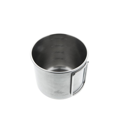 A photo of the Quechua MH150 0.4 L Stainless Steel Camping Mug in use