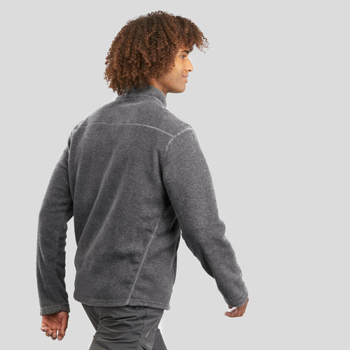 A photo of the Quechua Men's MH120 Hiking Fleece Jacket in use