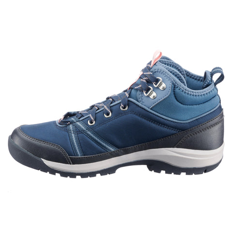 A photo of the Women's waterproof walking boots - NH150 mid - Khaki in use