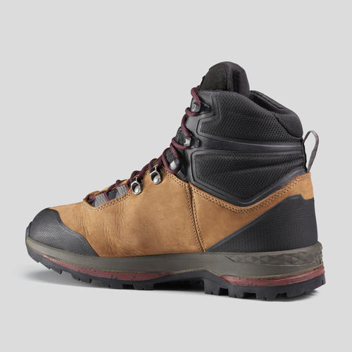 A photo of the Forclaz Trek 100 Flexible Leather Hiking Boots Women's in use
