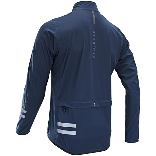 A photo of the Triban Men's RC500 Rainproof Cycling Jacket in use