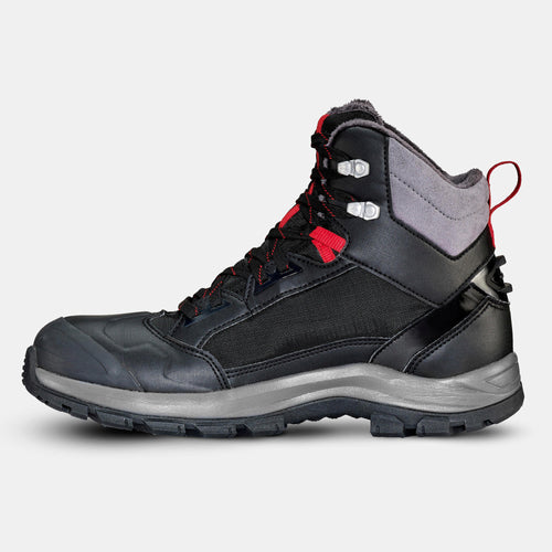 A photo of the Men's Warm and Waterproof Hiking Boots - SH500 mountain MID in use
