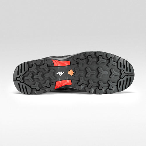 A photo of the Men's waterproof mountain hiking shoes - MH100 - Grey in use
