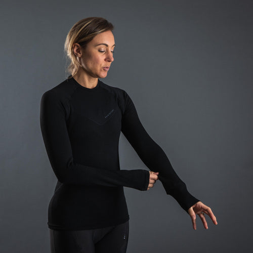 A photo of the Van Rysel Long-Sleeved Cycling Base Layer Women's in use
