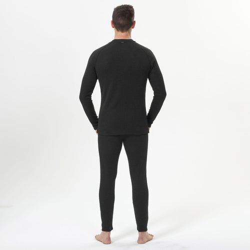 A photo of the Wedze Men's BL 100 Ski Base Layer Top in use