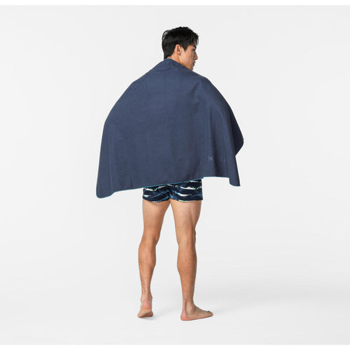 A photo of the Compact Beach Travel Water Camping Hiking Ribbed Large 51''x31'' Microfibe Towel in use