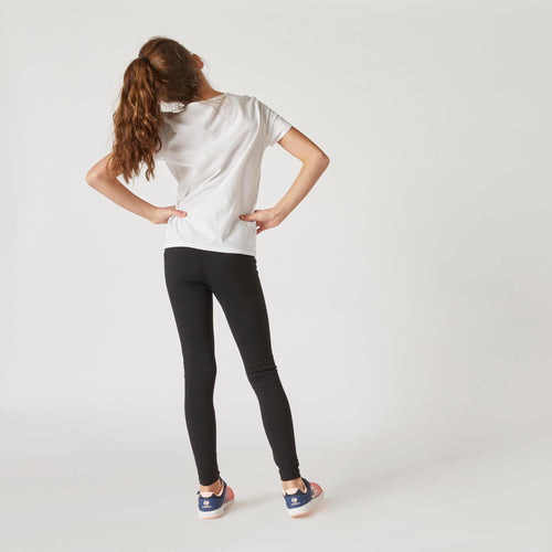 A photo of the Domyos 100 Short-Sleeved Gym T-Shirt Kids' in use