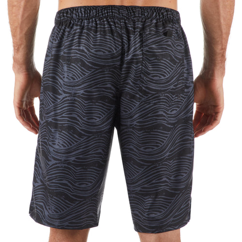 A photo of the Olaian 100 Long Surfing Boardshorts Men's in use