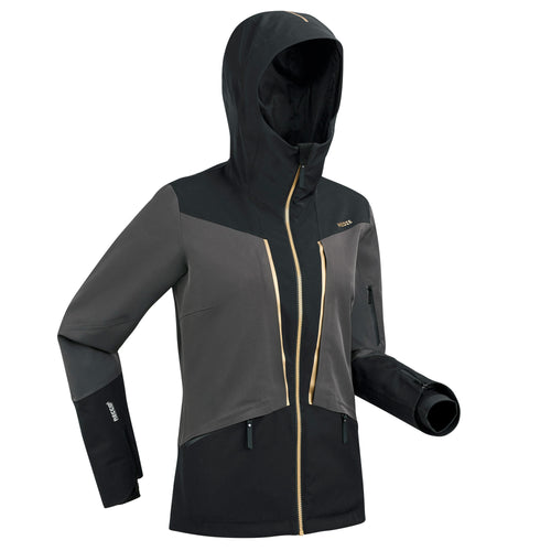 A photo of the Wedze 980 Downhill Ski Jacket with Removable Puffer Jacket Liner Women's in use
