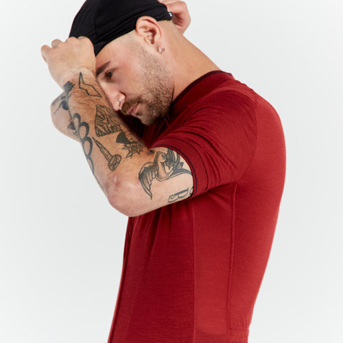 A photo of the Triban Men's GRVL 900 Merino Short-Sleeved Cycling Jersey in use
