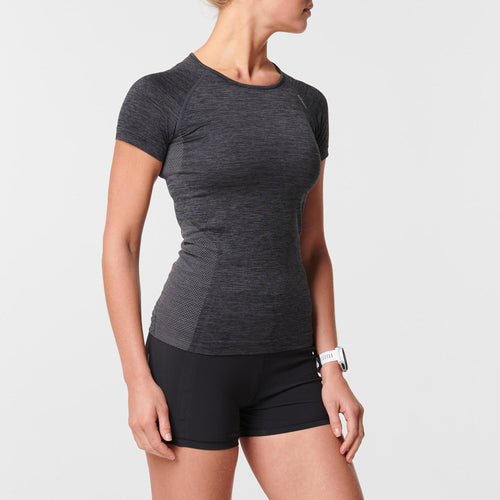 A photo of the Kiprun Skincare Breathable Running T-Shirt Women's in use