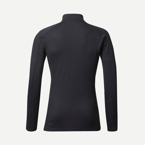 A photo of the Forclaz Men's MT500 Merino Wool Long-sleeve Shirt in use