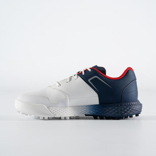 A photo of the BOY'S GRIP GOLF SHOES WATERPROOF - WHITE AND BLUE in use
