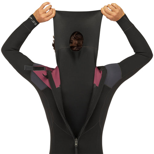 A photo of the Olaian 500 Stretch Neoprene Surfing Full Wetsuit Back zip 4 3mm Men in use