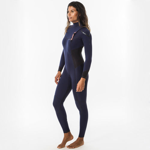 A photo of the Olaian 900 Stretch Neoprene Surfing Full Wetsuit Zipless 3 2mm Women in use