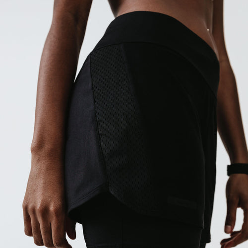 A photo of the Run Dry+ 2-in-1 Running Shorts with Built-In Briefs Women's in use