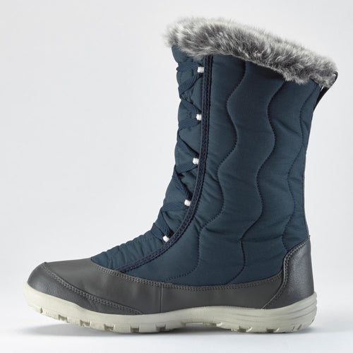 A photo of the Quechua SH500 X-Warm Waterproof Lace-Up Snow Boots Women's in use