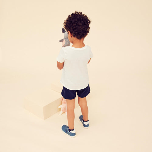 A photo of the Baby Basic T-Shirt - White in use