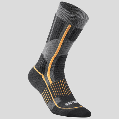 A photo of the Quechua SH500 Warm Hiking Socks - 2 Pairs in use