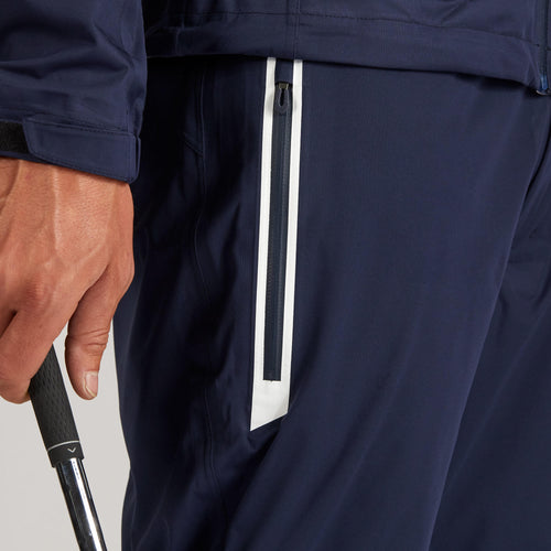 A photo of the Men's golf waterproof rain Pants - RW500 navy blue in use