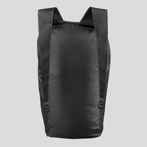 A photo of the Forclaz Compact 100 10 L Travel Backpack in use