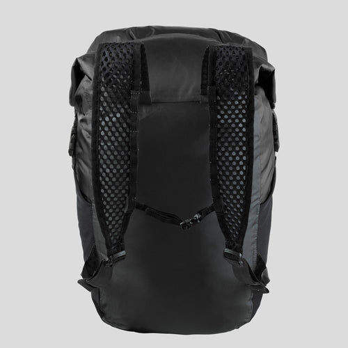 A photo of the Forclaz Travel 100 Compact Waterproof 20 L Hiking Backpack in use