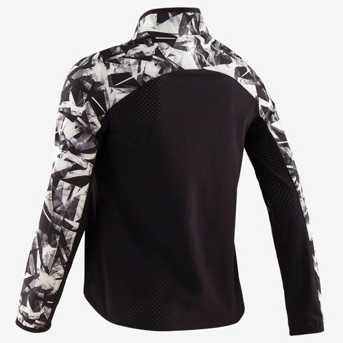 A photo of the Girls' Light Breathable Gym Jacket W500 - Black Print in use