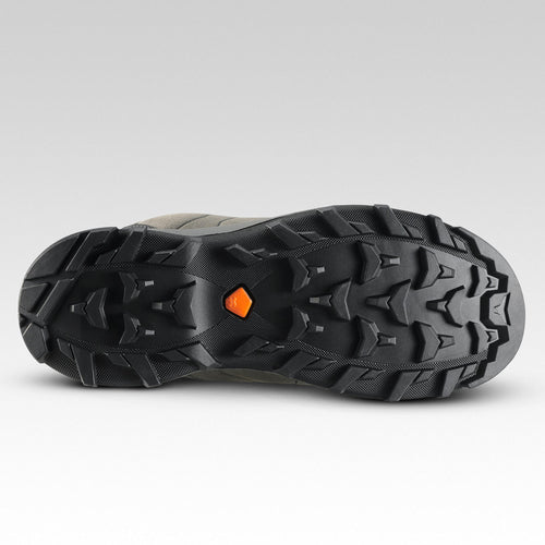 A photo of the Kids' Waterproof Mountain Walking Boots 10-6 MH500 Blue Grey in use